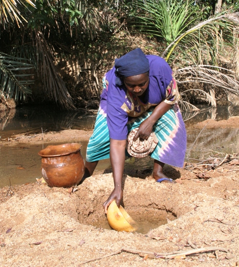 justina demonstrates collecting water
